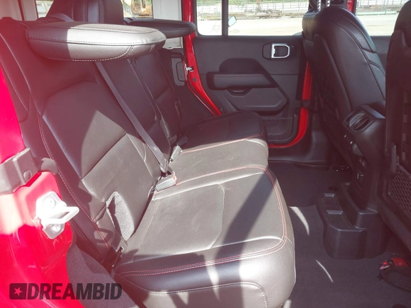 2022 Jeep Wrangler Unlimited Rubicon with VIN 1C4HJXFG0NW100620, listed as a IAAI auction lot 42534993 with 21,614 mi miles and . Bid and sale history available at DreamBid. Image 8.