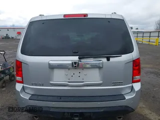 2015 Honda Pilot Touring with VIN 5FNYF4H94FB018152, listed as a IAAI auction lot 41812170 with 130,661 mi miles. Bid and sale history available at carsss.com. Image 16.