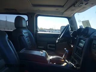 2003 Hummer H2 with VIN 5GRGN23U33H115187, listed as a IAAI auction lot 38374466 with 153,158 mi miles. Bid and sale history available at carsss.com. Image 5.
