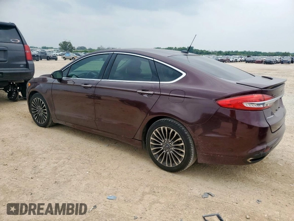2017 Ford Fusion Titanium with VIN 3FA6P0K90HR178834, listed as a Copart auction lot 57420795 with 127,977 mi miles and Salvage title. Bid and sale history available at DreamBid. Image 2.