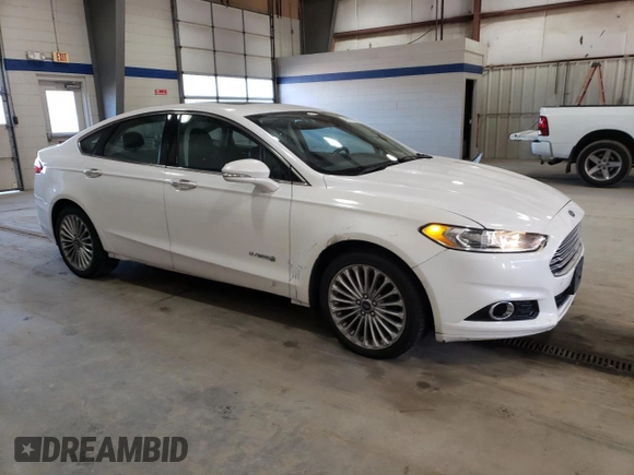 2013 Ford Fusion Titanium Hybrid with VIN 3FA6P0RU4DR334703, listed as a Copart auction lot 48821865 with 155,507 mi miles and Clean title. Bid and sale history available at DreamBid. Image 4.