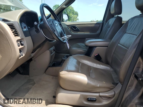 2002 Ford Escape XLT Choice with VIN 1FMYU04132KD84336, listed as a Copart auction lot 66705025 with 198,979 mi miles and Salvage title. Bid and sale history available at DreamBid. Image 7.