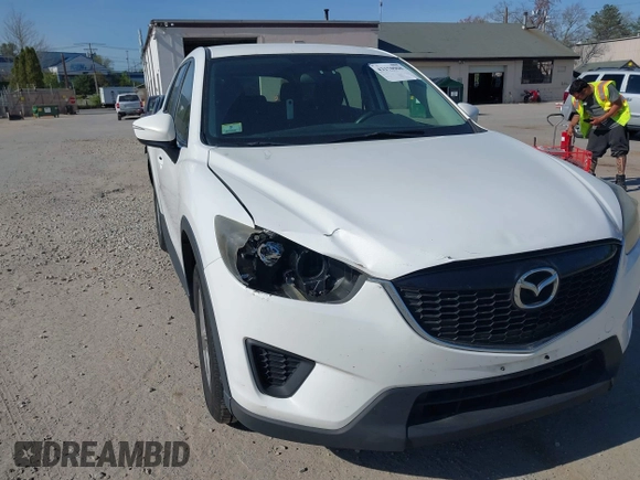 2015 Mazda CX-5 Sport with VIN JM3KE4BY3F0495511, listed as a IAAI auction lot 42170968 with 206,217 mi miles and . Bid and sale history available at carsss.com. Image 6.
