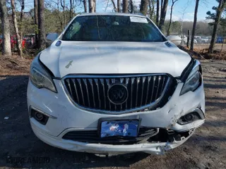 2017 Buick Envision Essence with VIN LRBFXBSA0HD044980, listed as a IAAI auction lot 41500618 with 106,585 mi miles. Bid and sale history available at carsss.com. Image 6.