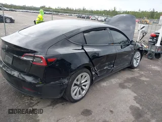2023 Tesla Model 3 z VIN 5YJ3E1EA4PF433466, wystawiony jako IAAI lot #42249247 z przebiegiem 39 808 mil mil oraz . Historia ofert i sprzedaży dostępna na DreamBid. Obrazek 4.