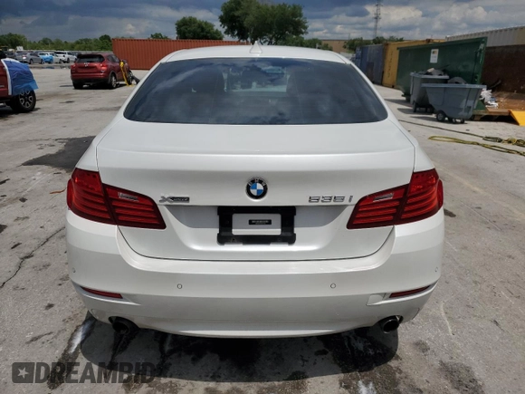 2016 BMW 5 Series 535i xDrive with VIN WBA5B3C56GG254528, listed as a Copart auction lot 56478005 with 141,550 mi miles and Salvage title. Bid and sale history available at DreamBid. Image 6.