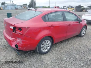 2013 Kia Rio LX with VIN KNADM4A30D6179274, listed as a IAAI auction lot 42014845 with 115,238 mi miles. Bid and sale history available at carsss.com. Image 4.