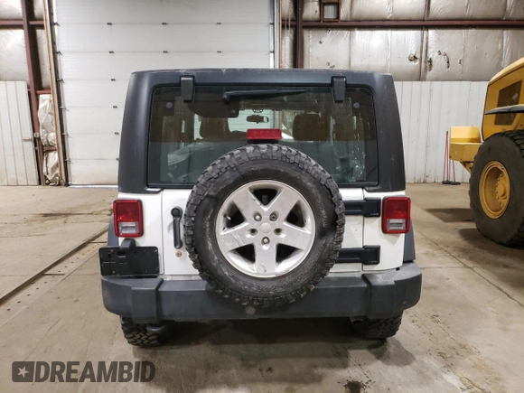 2012 Jeep Wrangler Sport z VIN 1C4AJWAG7CL256428, wystawiony jako Copart lot #66923465 z przebiegiem 36 478 mil mil oraz Szkoda całkowita • Salvage title. Historia ofert i sprzedaży dostępna na DreamBid. Obrazek 6.