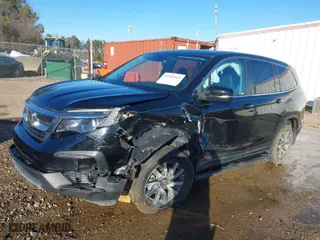 2021 Honda Pilot EX-L with VIN 5FNYF5H54MB038028, listed as a IAAI auction lot 41398565 with 63,779 mi miles. Bid and sale history available at carsss.com. Image 6.