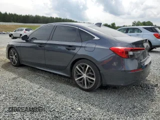 2024 Honda Civic Touring z VIN 2HGFE1F96RH324748, wystawiony jako Copart lot #58833725 z przebiegiem Nie podano mil oraz Szkoda całkowita • Salvage title. Historia ofert i sprzedaży dostępna na DreamBid. Obrazek 2.