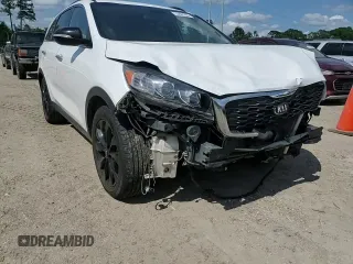 2020 Kia Sorento S z VIN 5XYPG4A55LG696039, wystawiony jako Copart lot #53807265 z przebiegiem 81 001 mil mil oraz Szkoda całkowita • Salvage title. Historia ofert i sprzedaży dostępna na DreamBid. Obrazek 13.