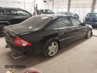 2002 Mercedes-Benz S-Class 6.0L with VIN WDBNG78J42A252823, listed as a IAAI auction lot 42051191 with 133,123 mi miles. Bid and sale history available at carsss.com. Image 4.