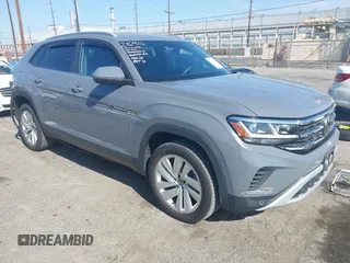2021 Volkswagen Atlas SE z VIN 1V2WE2CA9MC234751, wystawiony jako IAAI lot #41979424 z przebiegiem 30 132 mil mil oraz . Historia ofert i sprzedaży dostępna na DreamBid. Obrazek 1.