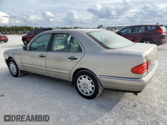 1999 Mercedes-Benz E-Class with VIN WDBJF82H9XX022535, listed as a Copart auction lot 86554534 with 140,904 mi miles and Salvage Title. Bid and sale history available at carsss.com. Image 2.