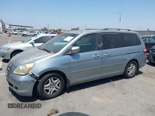 2005 Honda Odyssey EX with VIN 5FNRL38415B086709, listed as a IAAI auction lot 42308829 with 187,351 mi miles and . Bid and sale history available at DreamBid. Image 2.