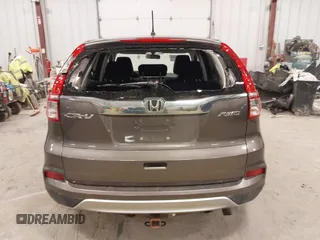 2015 Honda CR-V EX with VIN 2HKRM4H56FH670649, listed as a IAAI auction lot 42007616 with 142,353 mi miles and . Bid and sale history available at DreamBid. Image 16.
