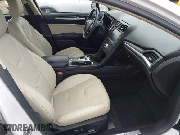 2017 Ford Fusion Titanium with VIN 3FA6P0SU2HR379834, listed as a IAAI auction lot 42440382 with 55,646 mi miles and . Bid and sale history available at DreamBid. Image 5.