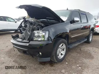2009 Chevrolet Suburban LTZ with VIN 1GNFK36389J124653, listed as a IAAI auction lot 41935393 with 117,144 mi miles. Bid and sale history available at carsss.com. Image 2.