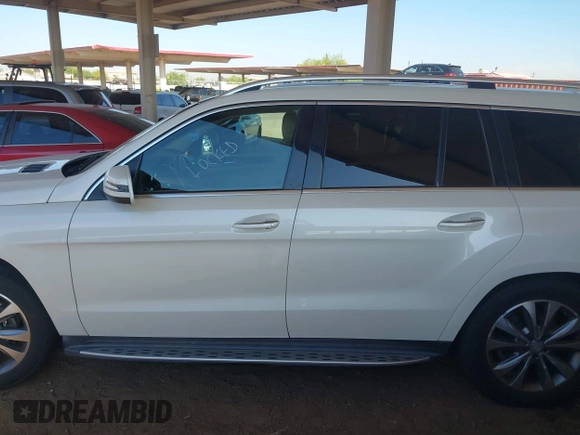 2014 Mercedes-Benz GL 450 with VIN 4JGDF7CE3EA336481, listed as a IAAI auction lot 42025576 with 145,244 mi miles and . Bid and sale history available at DreamBid. Image 14.