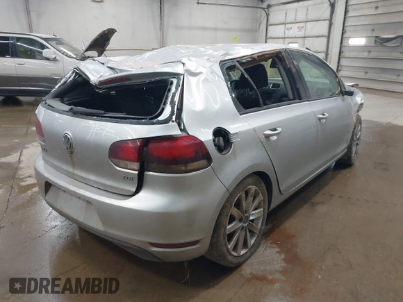2012 Volkswagen Golf TDI with VIN WVWNM7AJ8CW333137, listed as a IAAI auction lot 42585466 with 213,587 mi miles and . Bid and sale history available at DreamBid. Image 4.