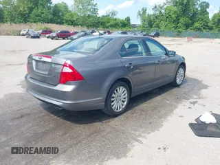 2011 Ford Fusion Hybrid with VIN 3FADP0L32BR132155, listed as a IAAI auction lot 42196233 with 77,900 mi miles and . Bid and sale history available at DreamBid. Image 4.