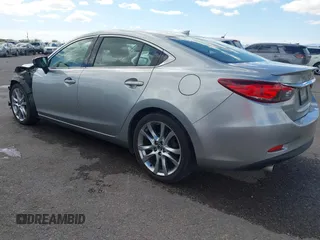 2014 Mazda 6 i Grand Touring with VIN JM1GJ1W57E1104801, listed as a IAAI auction lot 42060144 with 95,212 mi miles. Bid and sale history available at carsss.com. Image 3.