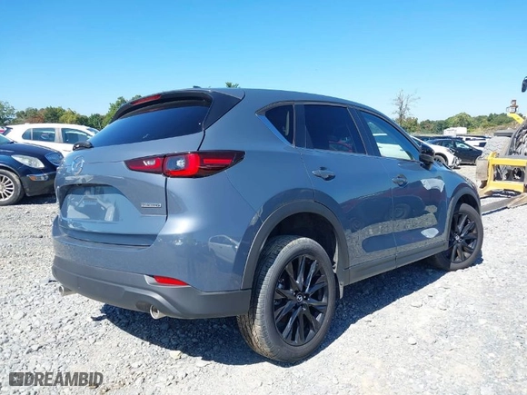 2022 Mazda CX-5 2.5 S Carbon Edition with VIN JM3KFBCM0N0549004, listed as a IAAI auction lot 35568022 with NaN miles. Bid and sale history available at carsss.com. Image 4.
