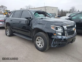 2017 Chevrolet Tahoe Commercial with VIN 1GNSKFEC3HR201575, listed as a IAAI auction lot 40974289 with 144,463 mi miles. Bid and sale history available at carsss.com. Image 1.