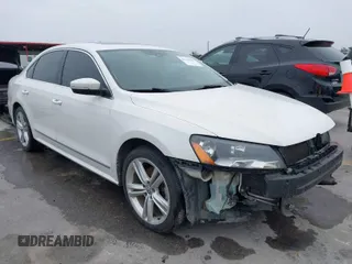 2014 Volkswagen Passat TDI SEL Premium with VIN 1VWCN7A32EC035738, listed as a IAAI auction lot 41641843 with 151,159 mi miles. Bid and sale history available at carsss.com. Image 1.