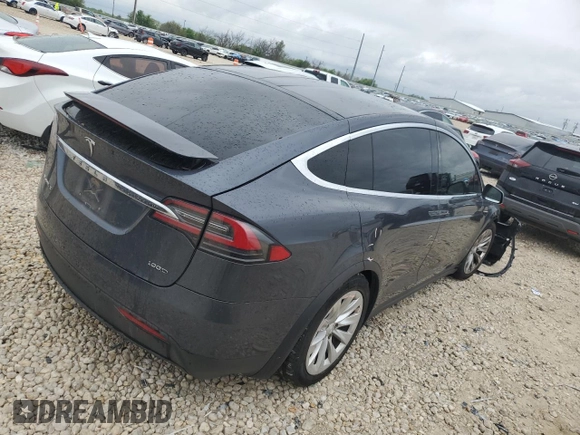 2017 Tesla Model X 90D with VIN 5YJXCBE26HF079246, listed as a Copart auction lot 50141605 with 68,905 mi miles and Salvage Title. Bid and sale history available at DreamBid. Image 3.
