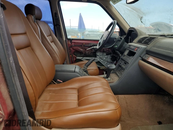 1996 Land Rover Range Rover z VIN SALPV144XTA333588, wystawiony jako Copart lot #65445765 z przebiegiem Nie podano mil oraz Czysty tytuł • Clean title. Historia ofert i sprzedaży dostępna na DreamBid. Obrazek 7.