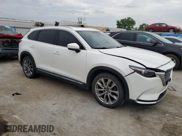 2016 Mazda CX-9 Grand Touring with VIN JM3TCBDY3G0117248, listed as a Copart auction lot 59703595 with 109,922 mi miles and Salvage title. Bid and sale history available at DreamBid. Image 4.