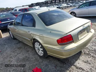 2002 Hyundai Sonata GLS with VIN KMHWF35HX2A506484, listed as a IAAI auction lot 41257939 with 280,153 mi miles. Bid and sale history available at carsss.com. Image 3.