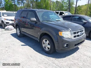 2011 Ford Escape XLT with VIN 1FMCU9DG5BKC36529, listed as a IAAI auction lot 42045682 with 141,101 mi miles. Bid and sale history available at carsss.com. Image 1.