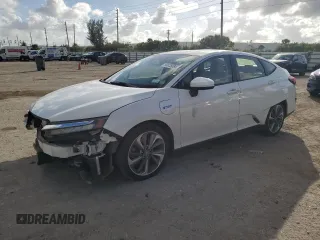 2018 Honda Clarity Plug-In Hybrid with VIN JHMZC5F12JC009678, listed as a Copart auction lot 80025584 with 60,876 mi miles and Salvage Title. Bid and sale history available at carsss.com. Image 1.