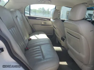 2004 Lincoln Town Car Signature with VIN 1LNHM81W04Y603672, listed as a Copart auction lot 52566725 with 214,180 mi miles and Salvage Title. Bid and sale history available at carsss.com. Image 10.