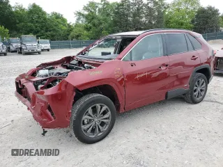 2024 Toyota RAV4 Hybrid XLE Premium z VIN 2T3B6RFVXRW082469, wystawiony jako Copart lot #56982665 z przebiegiem 7 595 mil mil oraz Szkoda całkowita • Salvage title. Historia ofert i sprzedaży dostępna na DreamBid. Obrazek 1.