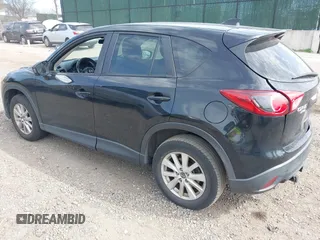 2014 Mazda CX-5 Sport with VIN JM3KE4BE4E0426931, listed as a IAAI auction lot 42055582 with 121,418 mi miles. Bid and sale history available at carsss.com. Image 3.