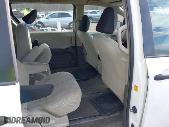 2011 Toyota Sienna with VIN 5TDZK3DC3BS058823, listed as a IAAI auction lot 41654859 with 227,969 mi miles. Bid and sale history available at carsss.com. Image 8.