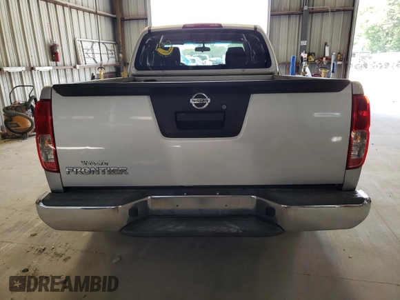 2015 Nissan Frontier SV with VIN 1N6BD0CT1FN713999, listed as a Copart auction lot 62053944 with 104,667 mi miles and Salvage title. Bid and sale history available at DreamBid. Image 6.