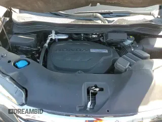 2018 Honda Pilot Touring с VIN 5FNYF5H95JB017056, выставлен на аукционе Copart как лот 85129355 с пробегом 90 621 миль миль и Списание • Salvage title. История ставок и продаж доступна на DreamBid. Изображение 16.