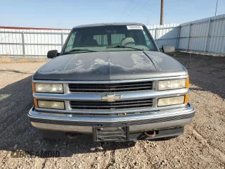 1999 Chevrolet Suburban with VIN 1GNFK16R4XJ483035, listed as a Copart auction lot 76666034 with 215,048 mi miles and Clean Title. Bid and sale history available at carsss.com. Image 5.
