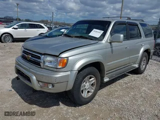 2000 Toyota 4Runner Limited with VIN JT3HN87R0Y9037357, listed as a IAAI auction lot 39201163 with 166,431 mi miles. Bid and sale history available at carsss.com. Image 2.
