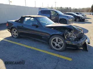 1999 Mercedes-Benz SL-Class with VIN WDBFA68F0XF175888, listed as a Copart auction lot 85984514 with 97,975 mi miles and Salvage Title. Bid and sale history available at carsss.com. Image 4.