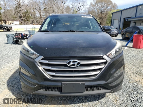 2017 Hyundai Tucson SE with VIN KM8J33A47HU401866, listed as a Copart auction lot 49777715 with 103,316 mi miles and Salvage Title. Bid and sale history available at DreamBid. Image 5.