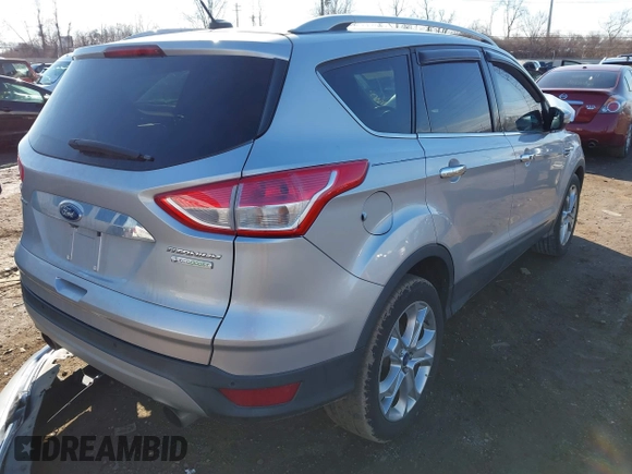 2015 Ford Escape Titanium with VIN 1FMCU0J93FUC02844, listed as a IAAI auction lot 41531293 with 115,392 mi miles and . Bid and sale history available at DreamBid. Image 4.