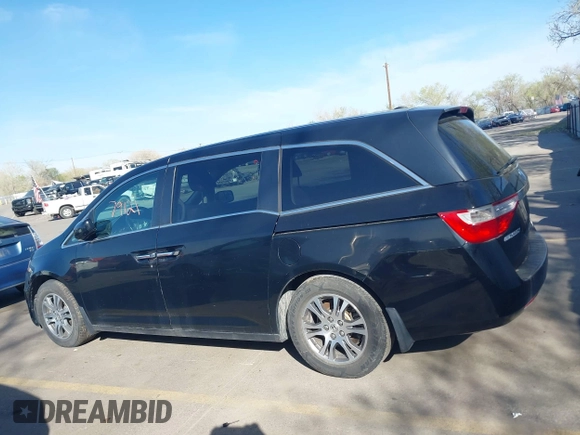 2012 Honda Odyssey EX-L with VIN 5FNRL5H68CB025481, listed as a IAAI auction lot 41979121 with Not Provided miles and . Bid and sale history available at DreamBid. Image 13.