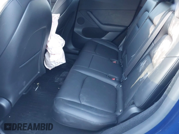 2024 Tesla Model Y Long Range with VIN 7SAYGDEE2RF129577, listed as a IAAI auction lot 41357180 with 6,697 mi miles and . Bid and sale history available at DreamBid. Image 8.