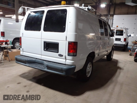2014 Ford Econoline Cargo Commercial with VIN 1FTNE2EL6EDB13764, listed as a IAAI auction lot 42647684 with 99,876 mi miles and . Bid and sale history available at DreamBid. Image 4.