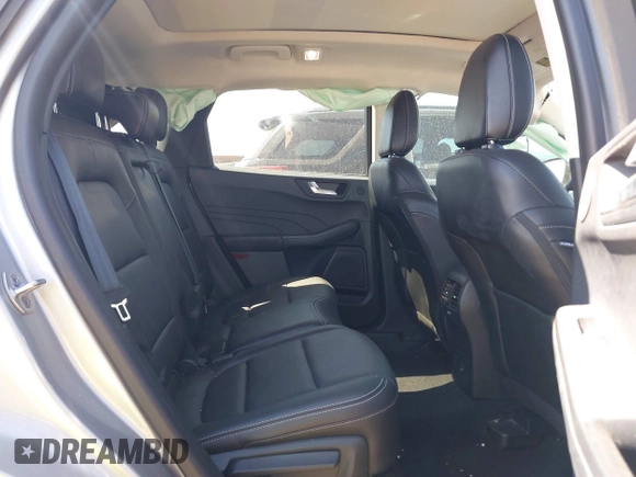 2021 Ford Escape Titanium Hybrid z VIN 1FMCU0DZ3MUB04065, wystawiony jako IAAI lot #41764797 z przebiegiem 28 881 mil mil oraz . Historia ofert i sprzedaży dostępna na DreamBid. Obrazek 8.